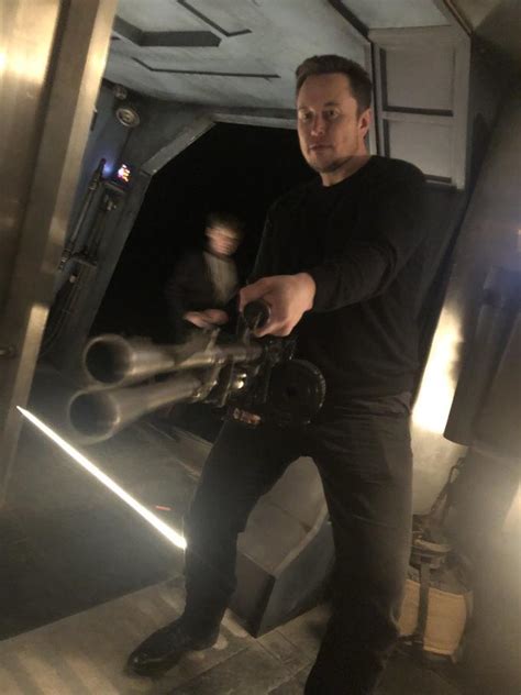 Elon Musk Holding a Minigun | Know Your Meme