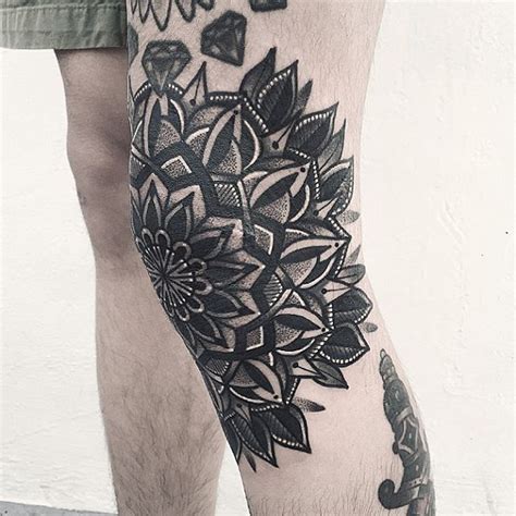 Black floral mandala tattoo on the left knee | Floral mandala tattoo, Knee tattoo, Black tattoos