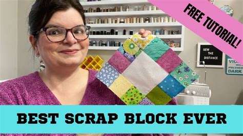 a woman holding up a piece of fabric with the words best scrap block ever
