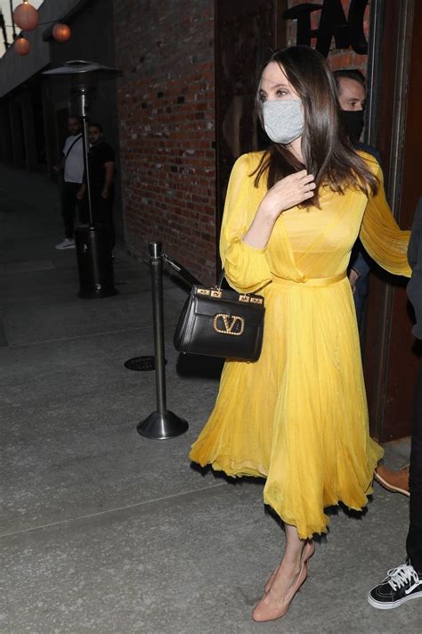 Angelina Jolie - In a yellow dress at TAO on her 46th birthday in L.A ...