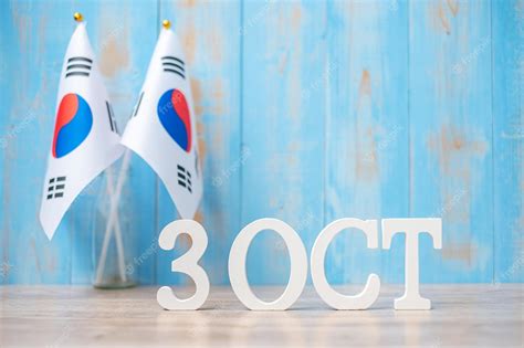 Premium Photo | Wooden text of october 3rd with republic of korea flags national foundation day ...