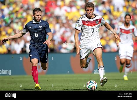 Yohan Cabaye and Thomas Mueller Muller. France v Germany, quarter-final ...