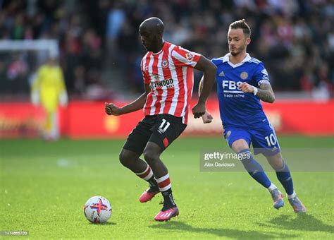 Yoane Wissa of Brentford battles with James Maddison of Leicester ...