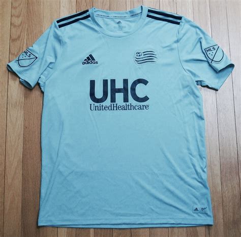 New England Revolution Special football shirt 2019. Sponsored by UHC