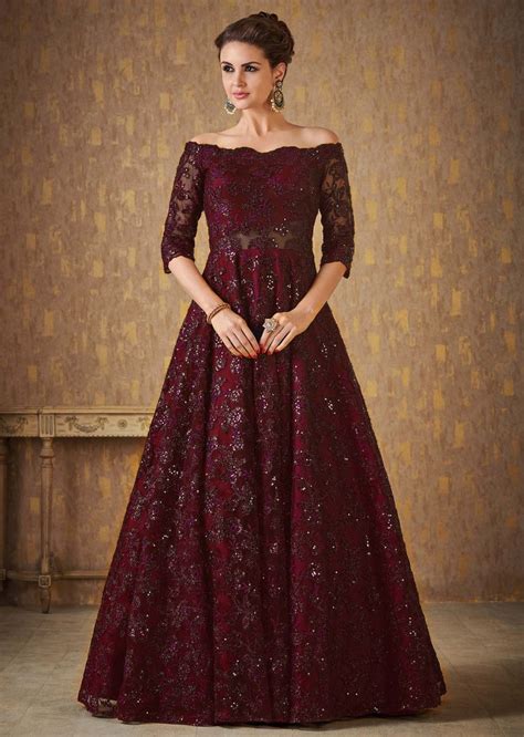 Dark Maroon Off Shoulder Gown Adorned In Embossed Thread And Sequin ...