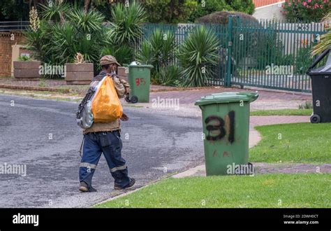 Johannesburg, South Africa - dustbin diving to salvage plastic, food ...