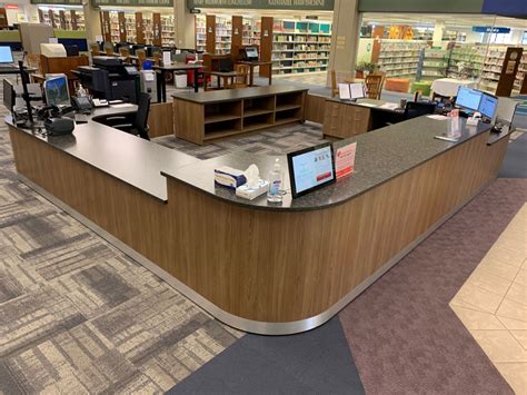 Muskego Curved Circulation Desk - Library Furniture International