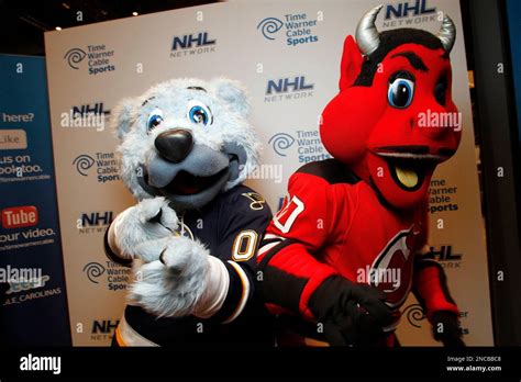 New Jersey Devils mascot NJ Devil ,right, and St. Louis Blues mascot ...