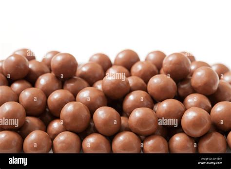 Close up of chocolate balls - Maltesers - against a white background ...