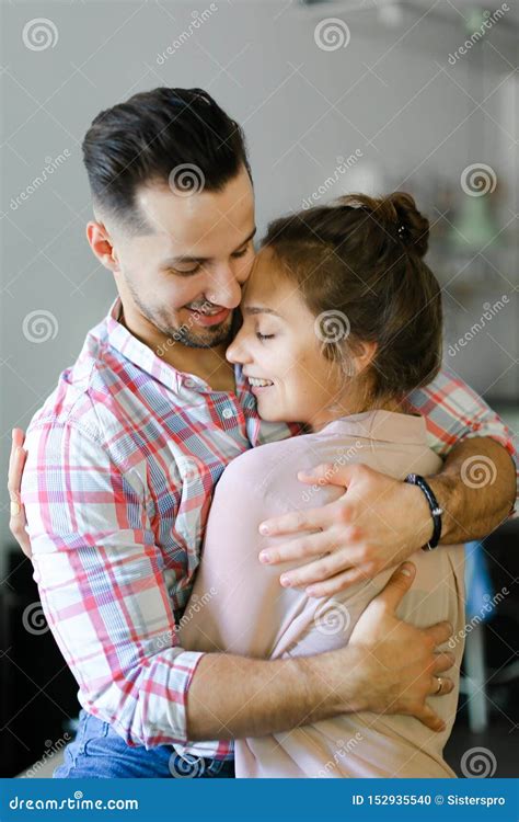 Happy Pretty Husband Hugging Wife at Home. Stock Photo - Image of ...