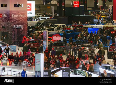 Chicago, IL, USA - February 15, 2023: Crowds attendind the annual 2023 Chicago Auto Show on ...