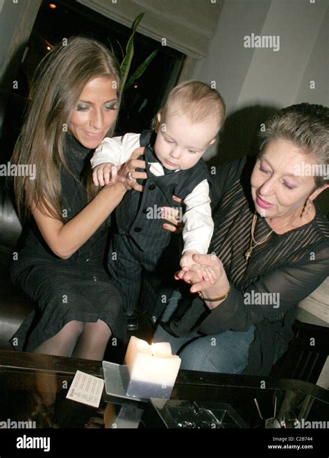 Andrey Arshavin`s wife Julia Arshavina (L) with their little son Artem ...