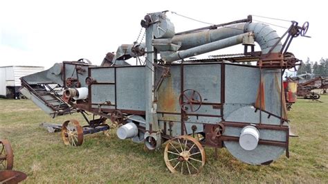 Old time threshing machine | Old farm equipment, Farm equipment, Farm machinery