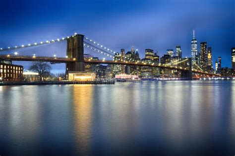 Brooklyn Bridge at night stock photo. Image of light - 145412252