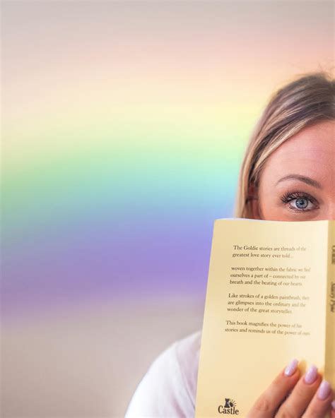 Cheerful woman covering face with book · Free Stock Photo