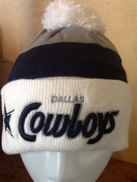 Dallas Cowboys WINTER KNIT New Era Cuffed Pom Beanie in Football-NFL ...