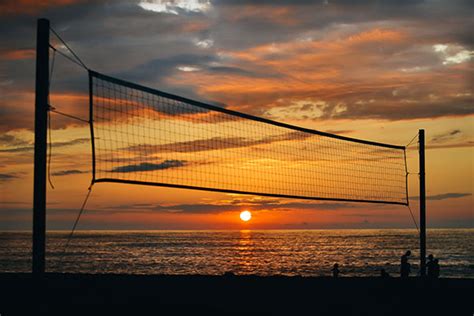 Volleyball Net on the Seabeach at Sunset Graphic by ...