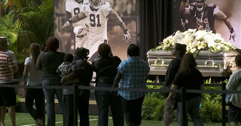 Fans, friends and teammates honor New Orleans Saints' Will Smith - CBS News