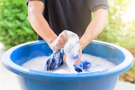 Washing Clothes by Hand in the Basin, White Clothes Mess Up Red Color ...