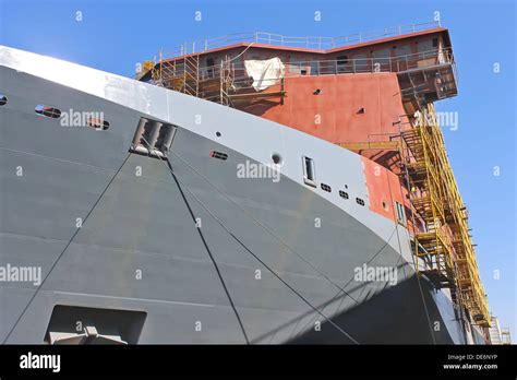 The construction of a new ship in dry dock shipyard Stock Photo - Alamy