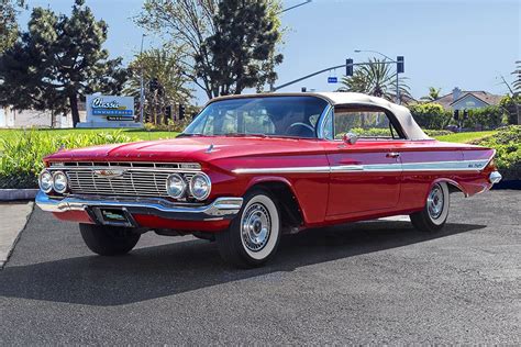 1961 Chevy Impala in the Classic Industries visitor's parking lot. | Hot rods cars muscle ...