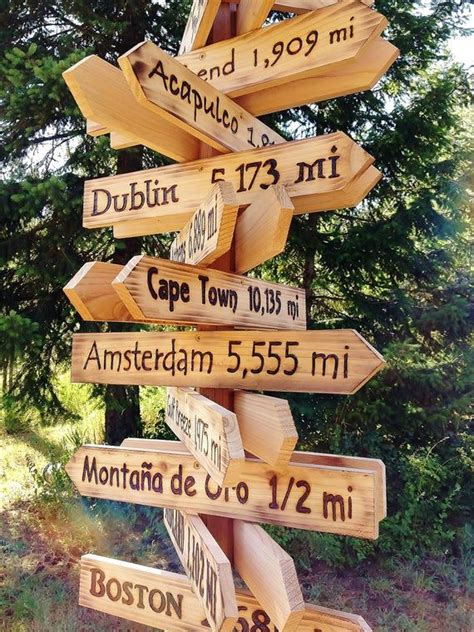 These rustic directional signs are customized to include any location ...