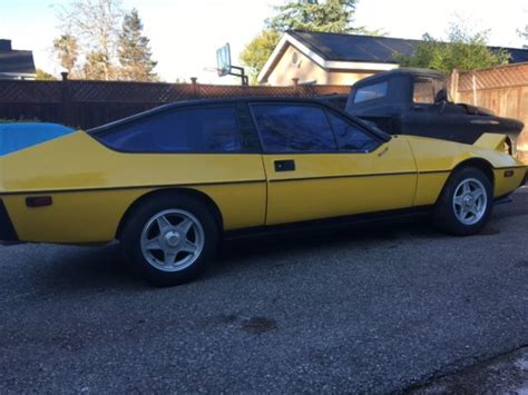 1976 Yellow Lotus Eclat with an spare Lotus Eclat car, for restoration ...