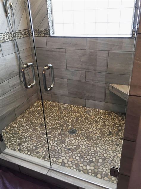 #bathroomtileideas in 2020 | Pebble tile shower floor, Stone shower ...