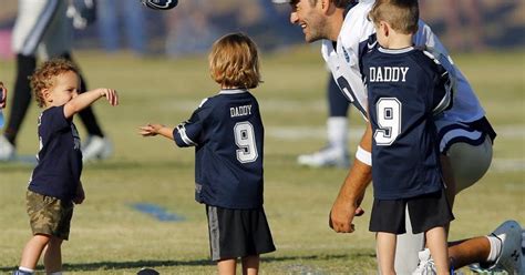 Tony Romo tries to show his young sons how to play football in adorable ...