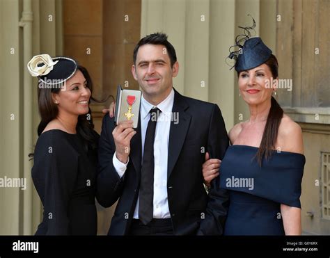 Snooker player Ronnie O'Sullivan poses with his partner Laila Rouass ...