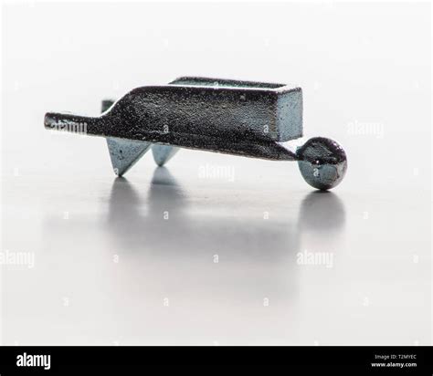 Monopoly board game pieces Stock Photo - Alamy