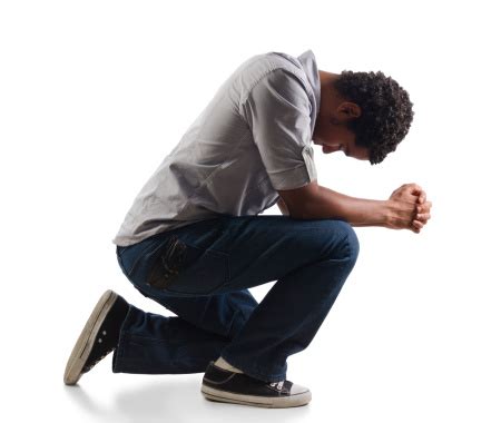 Young Man Praying On His Knees Stock Photo - Download Image Now - Kneeling, Men, Praying - iStock