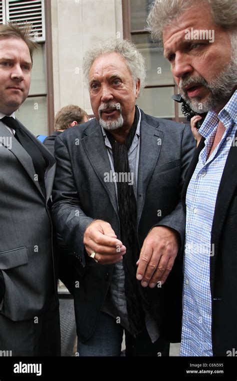 Tom Jones and his son Mark Woodward outside the BBC Radio One studios Stock Photo, Royalty Free ...