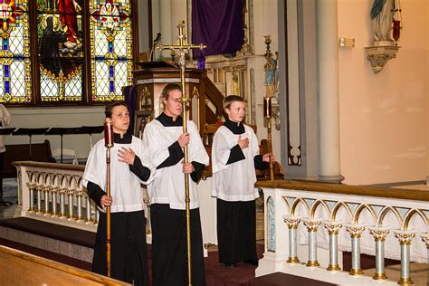 22 Altar Servers During Stations Of The Cross Photograph by Tom Gilbrough