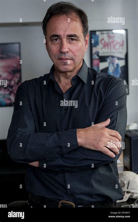Writer Anthony Horowitz at desk in his home office Stock Photo - Alamy