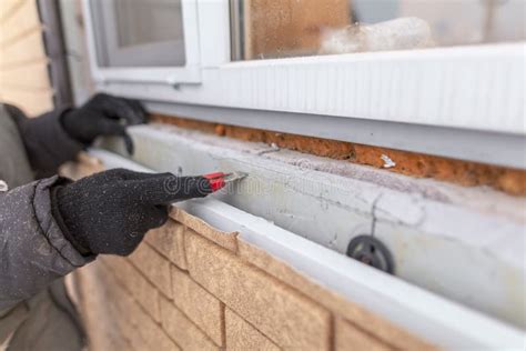 Installing Brick Siding on the Wall of the House Stock Photo - Image of ...