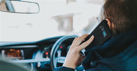 The laws for mobile phone use when driving - Driving Insights