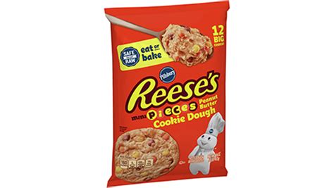 an orange bag of cereals on a white background with the word reese's in it