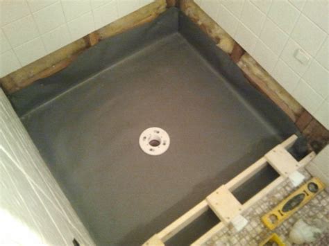 Shower floor repair - pan liner, curb, and finish coat - Tile Contractor | Creative Tile Works ...