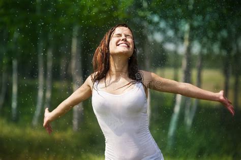 Happy woman in the rain stock photo. Image of rain, happiness - 31805470