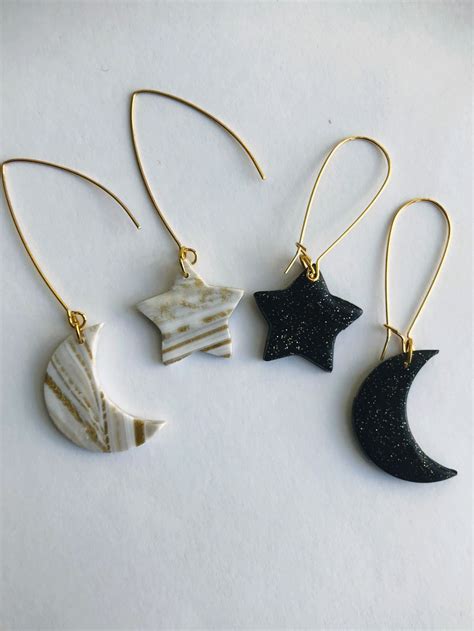 Star and Moon Asymmetrical Earrings, $14 | Polymer clay earrings, Diy clay earrings, Polymer ...