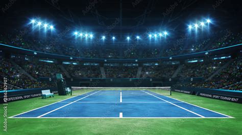 Blue tennis court and illuminated indoor arena with fans, upper front view, professional tennis ...