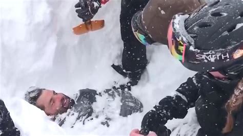 Watch moment snowboarder is rescued alive after avalanche - NBC News