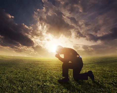 Praying at sunset - Stock Image - Everypixel