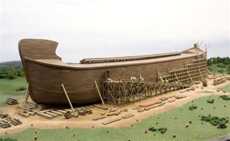 a model of a wooden boat on display