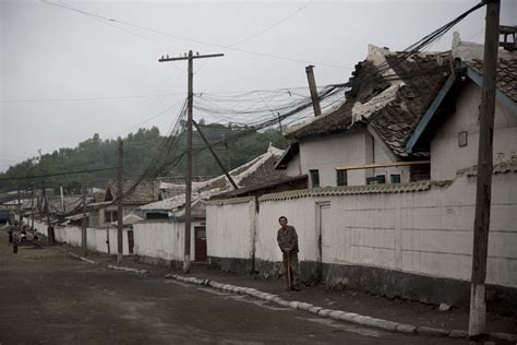 In this June 20, 2014 photo, a North Korean man stands in front of a ...