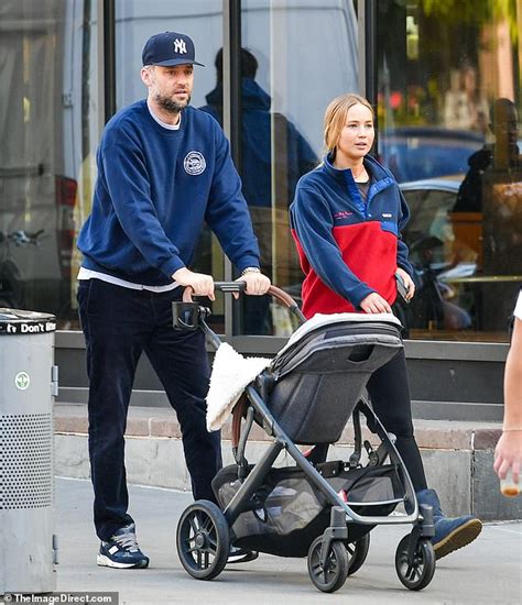 Jennifer Lawrence and husband Cooke Maroney push baby Cy in stroller on rare sighting in New ...