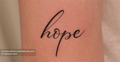 "Hope" lettering tattoo on the tricep.