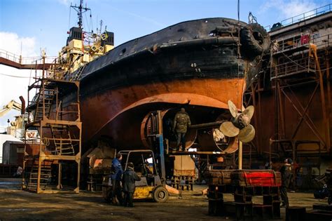 Premium Photo | Industrial ship repair and maintenance executed by ...