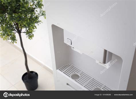 Office water cooler Stock Photo by ©belchonock 191408288